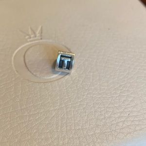 Authentic Pandora letter “T” charm.